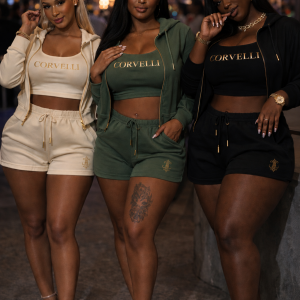 Three women wearing Corvelli Private Summer Sets in ivory, olive and black